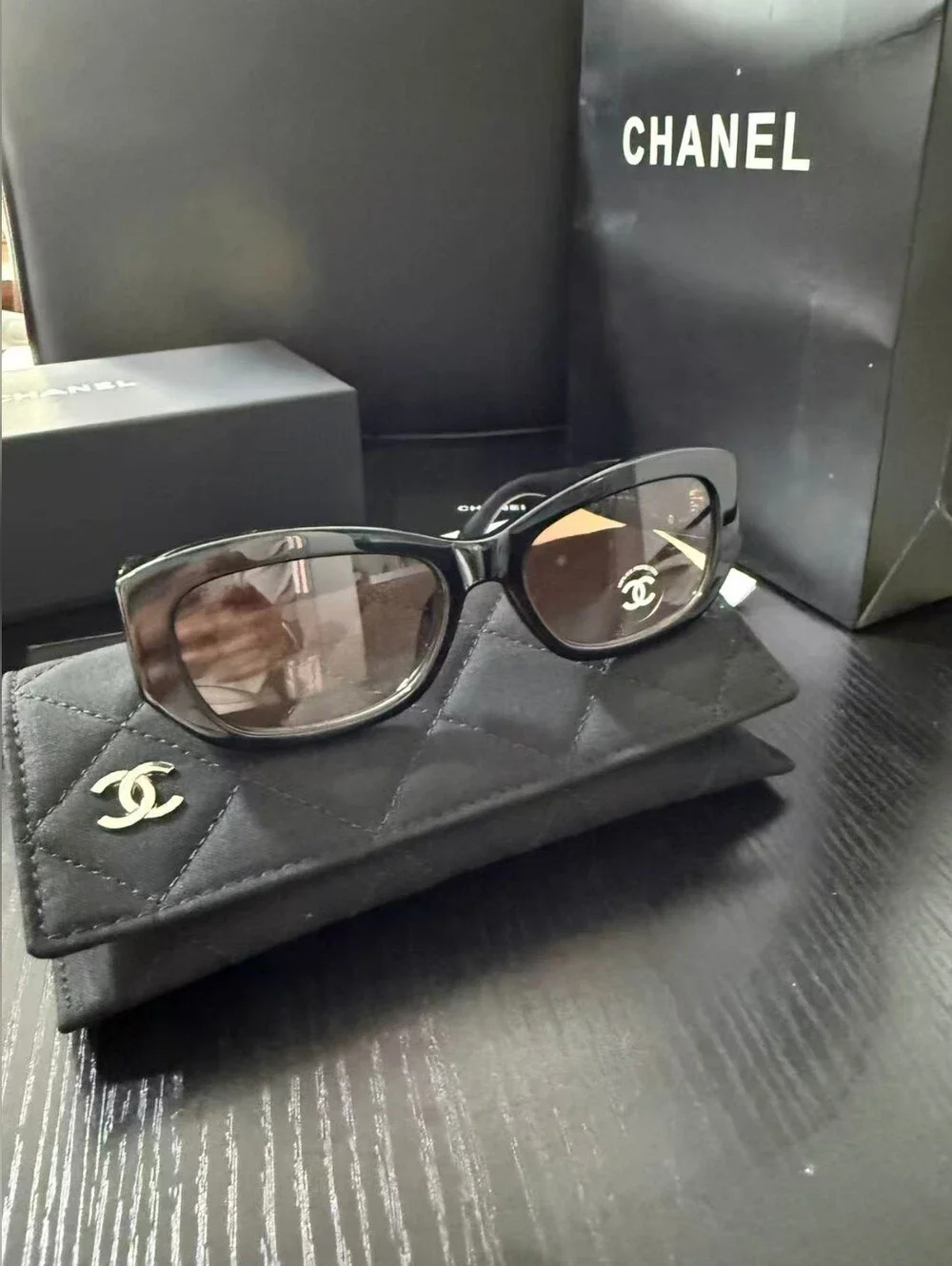 CHANEL Black Frame Sunglasses with Brown Gradient Lenses